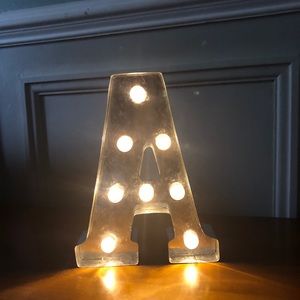 Light up silver A sign aprox 10”x7”